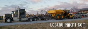 Volvo A60H Rock Truck on lowbed and hauled