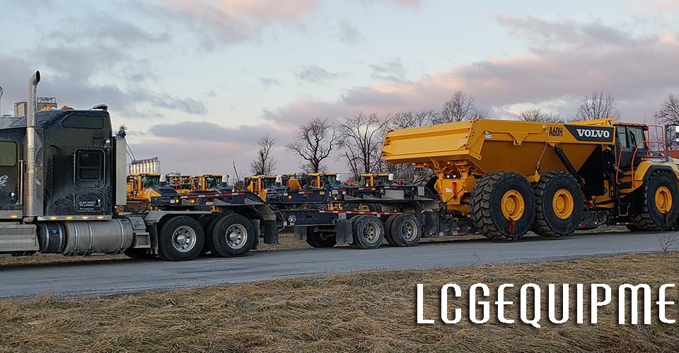 Volvo A60H Rock Truck on lowbed and hauled